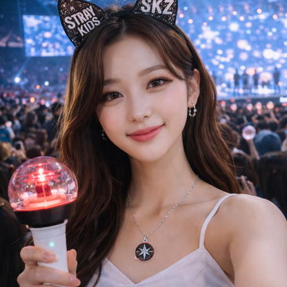 K-pop fan wearing Stray Kids SKZ logo necklace at concert